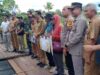Pj Bupati Bersama Dandim, Kapolres, Kadis Pertanian, Kepala Desa Panen Raya Padi Bersama Masyarakat Rarawa