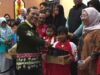 Pemkab Murung Raya Salurkan 230 Pasang Sepatu untuk Siswa, Tingkatkan Semangat Belajar