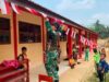 Tanamkan Jiwa Nasionalisme, Pos Sei Tekam Satgas Yonarmed 13/Nanggala Bersama Siswa SDN 25 Perimpah Pasang Bendera Merah Putih